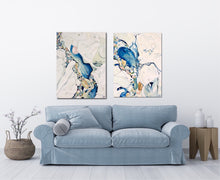 Load image into Gallery viewer, Abstract painting in shades of blue and oyster white with small multicoloured pieces. In situ on a white wall with matching print Loves Bay I.
