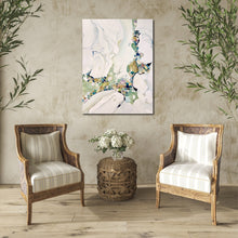 Load image into Gallery viewer, Abstract painting in shades of sea green and oyster white with small multicoloured pieces. In situ on a green marbled sitting room wall.
