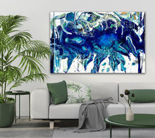 Load image into Gallery viewer, Abstract oil painting on a white background in shades of blue, white and green, on wall next to palm.
