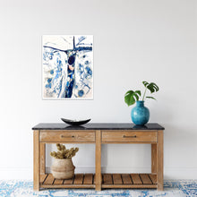 Load image into Gallery viewer, Abstract oil painting on a white background in shades of blue, on wall above hall stand.
