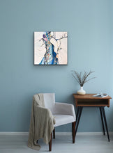 Load image into Gallery viewer, Abstract painting with white background and small multicoloured detail. In situ on a eggshell blue wall.
