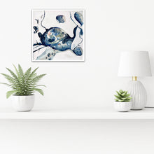 Load image into Gallery viewer, An abstract style rock pool on a white background in shades of blue with multicoloured detail. In situ on a white wall.
