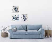 Load image into Gallery viewer, Oil painting of a rock pool in an abstract style on a white background in shades of blue with multicoloured detail. In situ with 2 other matching paintings.
