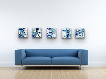 Load image into Gallery viewer, Abstract painting of a rock pool in shades of blue, aqua, turquoise, pink ochre yellow and white. In situ on a white wall with 4 other matching paintings above a blue sofa.
