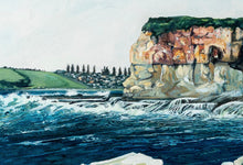 Load image into Gallery viewer, Coastal scene looking towards Werri Beach NSW, with a white rock platform, ocean swell and waves in the foreground, red cliffs in the background and a grassy headland with pine trees in the distance. Close up, detail view
