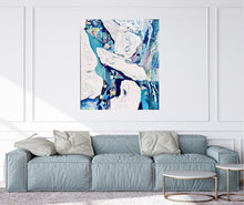 Load image into Gallery viewer, Abstract oil painting in white and blue with small multi-colours depicting stained glass. In situ on a white wall above a blue-grey sofa.
