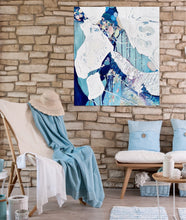 Load image into Gallery viewer, Abstract painting in white and blue with small multi-colours depicting stained glass. In situ on a brick wall.

